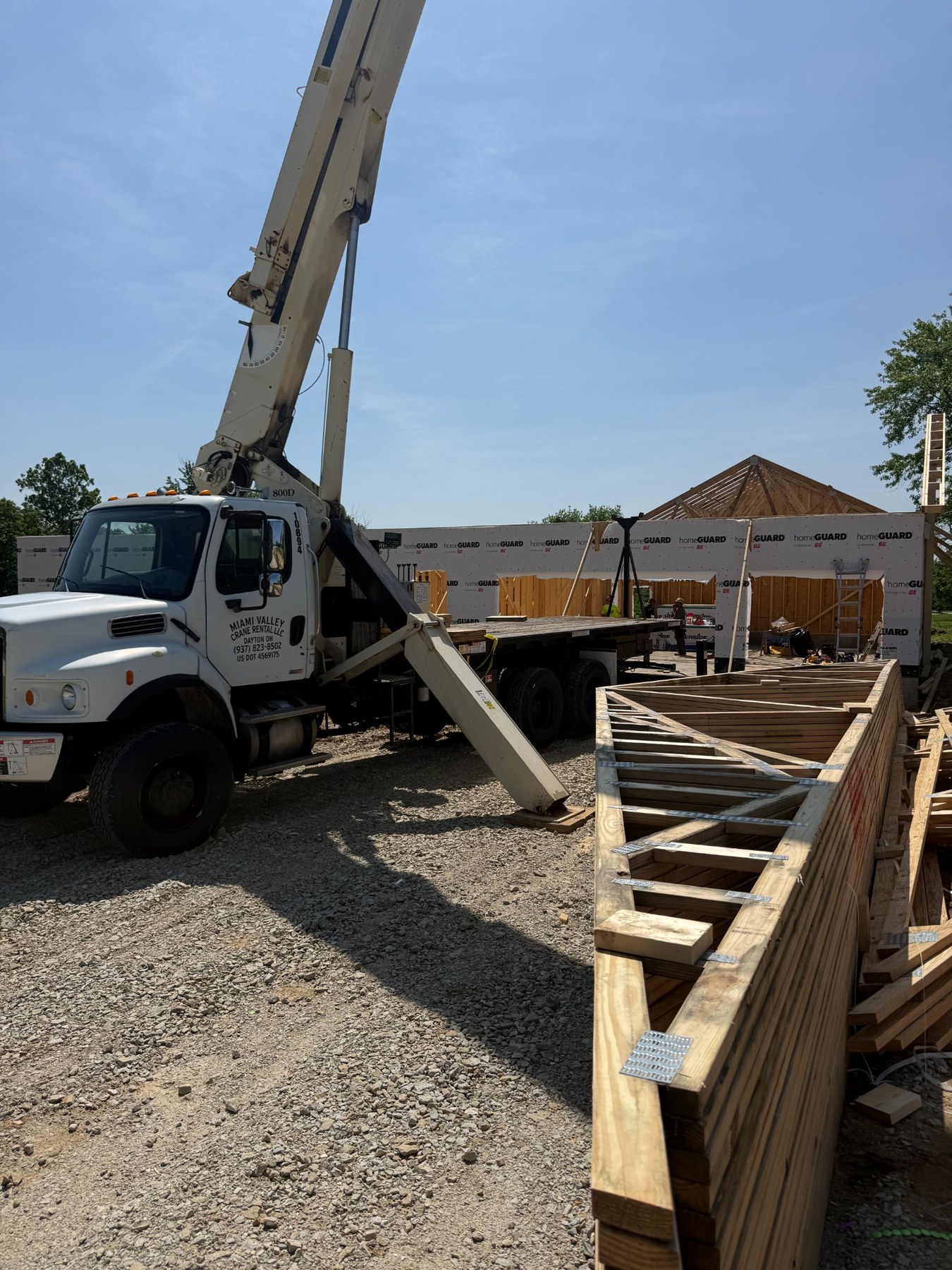 Crane and trusses on a residential construction site